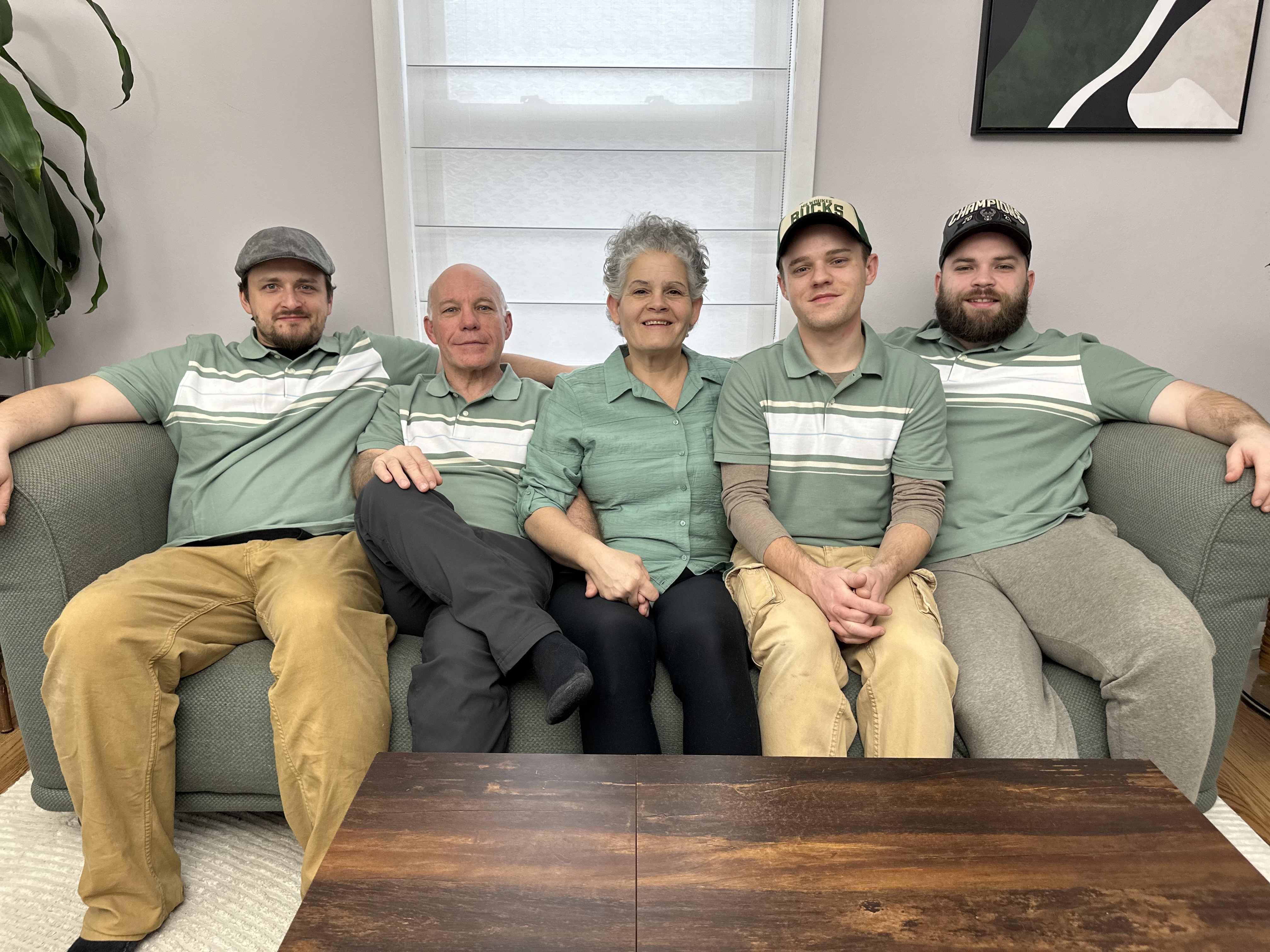 Family in green shirts
